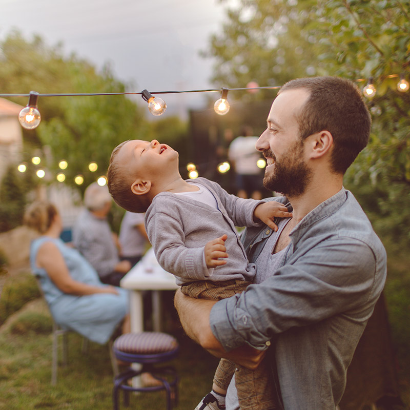 assurant-about-father-son-Fr-Fr-Fr Father and son at a backyard party